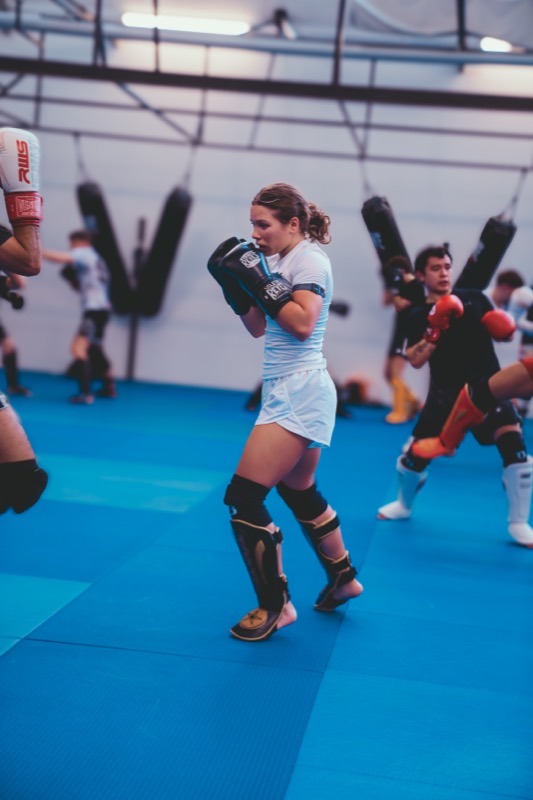 Eva Tschanz training in gloves and shin guards
